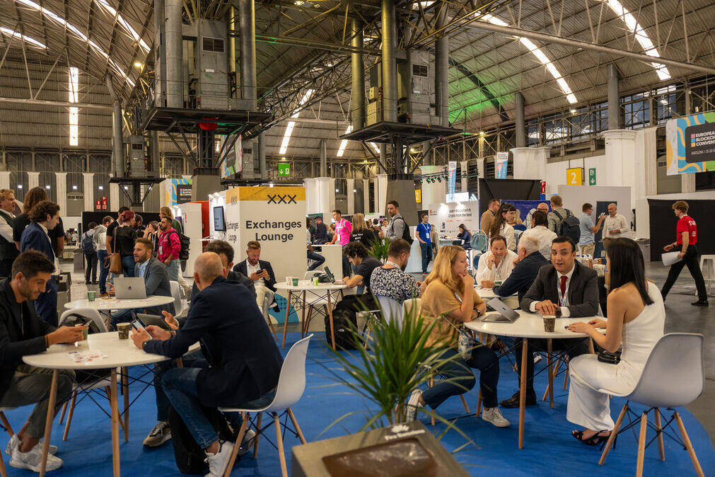 Photo of EBC attendees networking at the conference